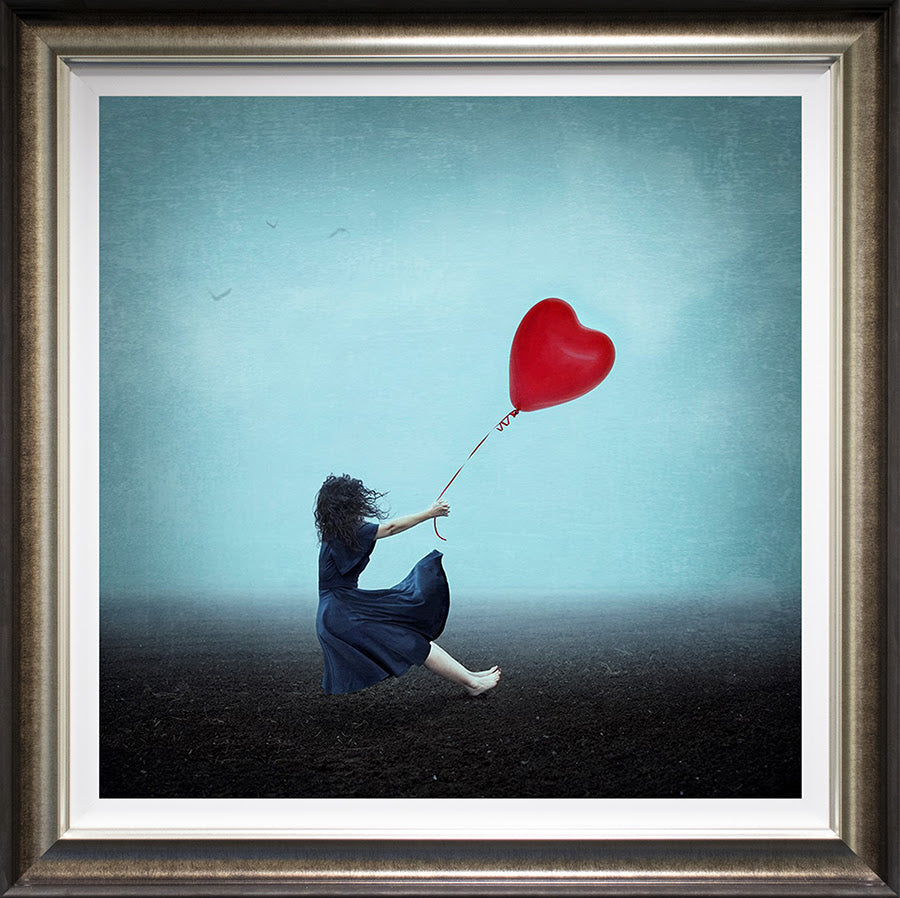 holding onto her heart deluxe framed print by artist michelle mackie