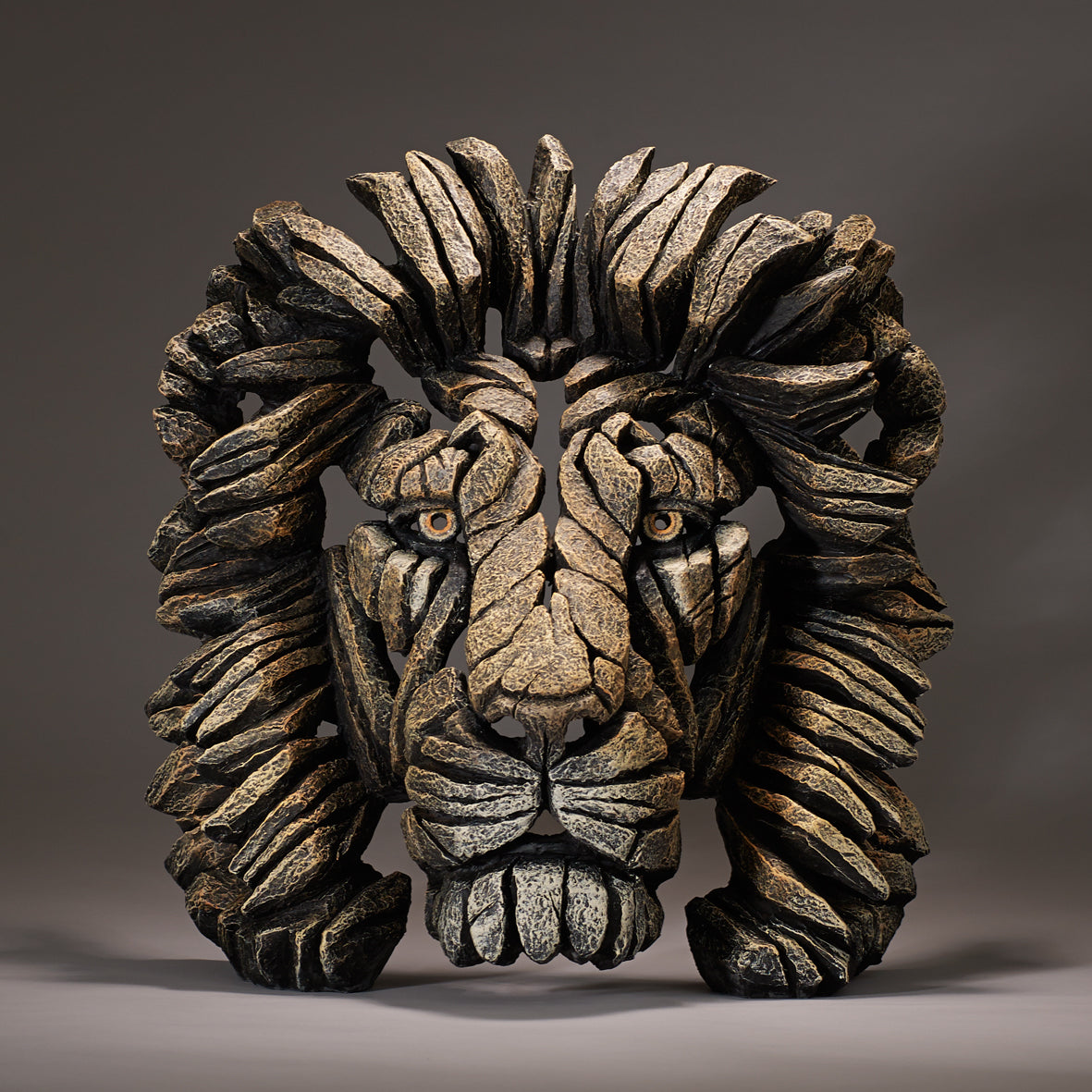lion sculpture bust in savannah colouring by artist edge sculpture