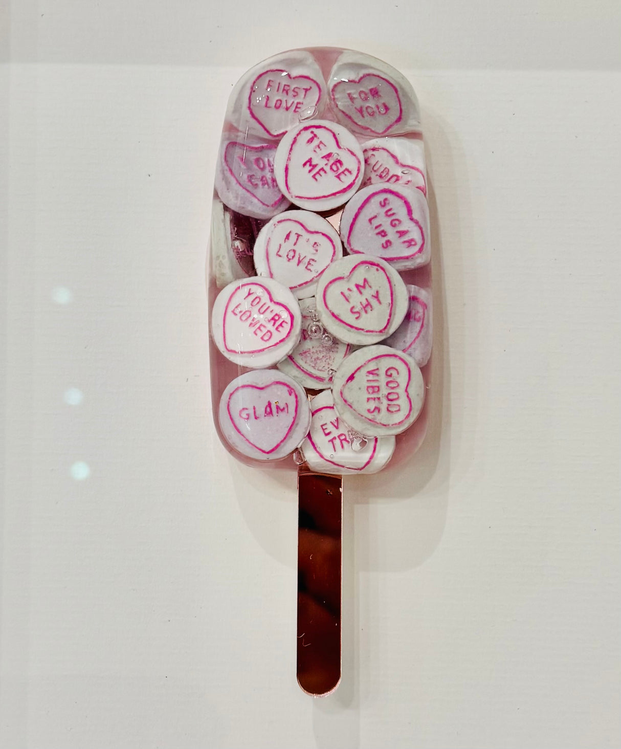 love hearts close up of original resin lollipop by artist dotty