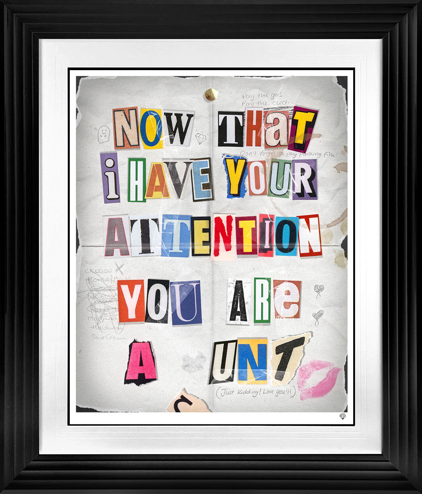 the ransom note print framed in black by artist jj adams