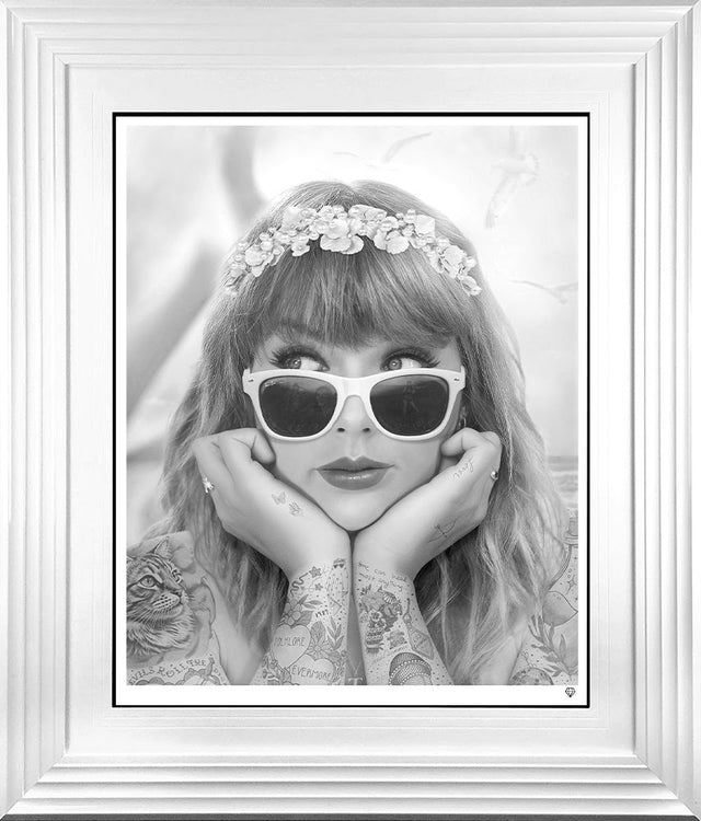 champagne problems black and white print framed in white by artist jj adams