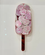 love hearts close up of original resin lollipop by artist dotty