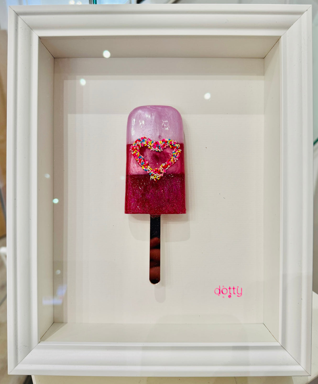 love lolly original resin lollipop framed by artist dotty