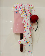 melting close up of original resin lollipop by artist dotty