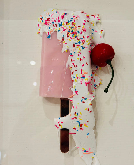 melting close up of original resin lollipop by artist dotty