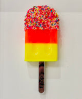 sprinkles close up of original resin lollipop by artist dotty
