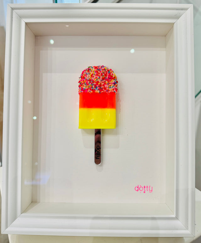 sprinkles original resin lollipop framed by artist dotty